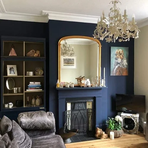Dark feature wall and fireplace decorated by Sturmans Decorating